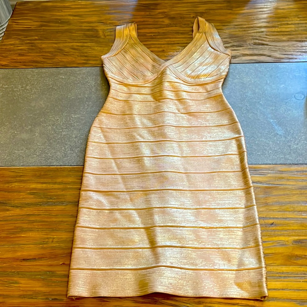 Womens coutore size 4 . Bandage dress worn once , very slimming.